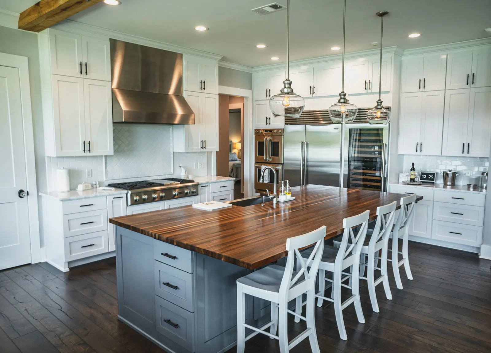 Custom kitchen with large island and copper hood